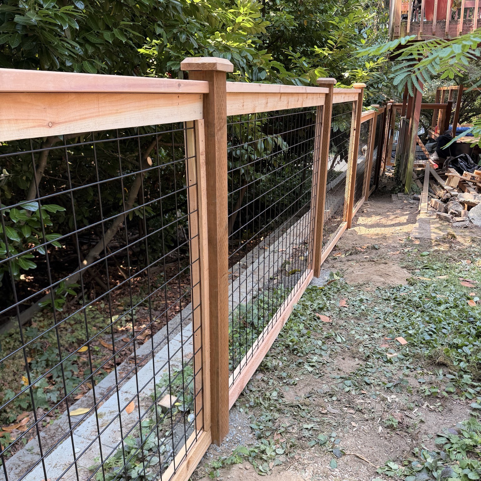 Hog wire fencing with cedar framing
