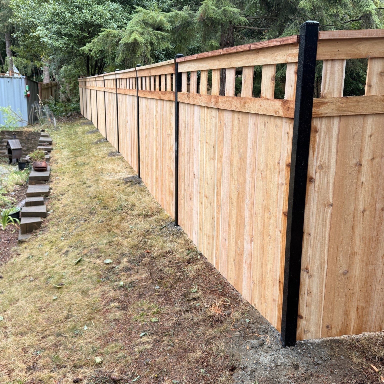 Cedar privacy fence with open upper panels